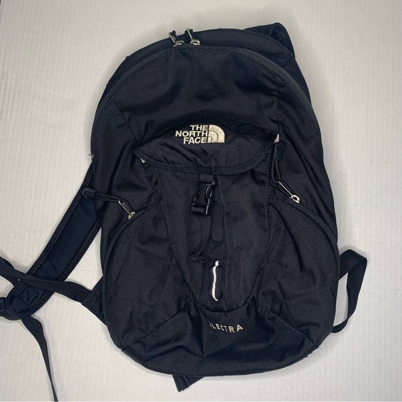 electra backpack north face Women's in Medium Grey Heather and Ice Green by The Grey The front elastic bungee system allows you to easily store and access items like a jacket or helmet Sportisimo North Face Electra Backpack